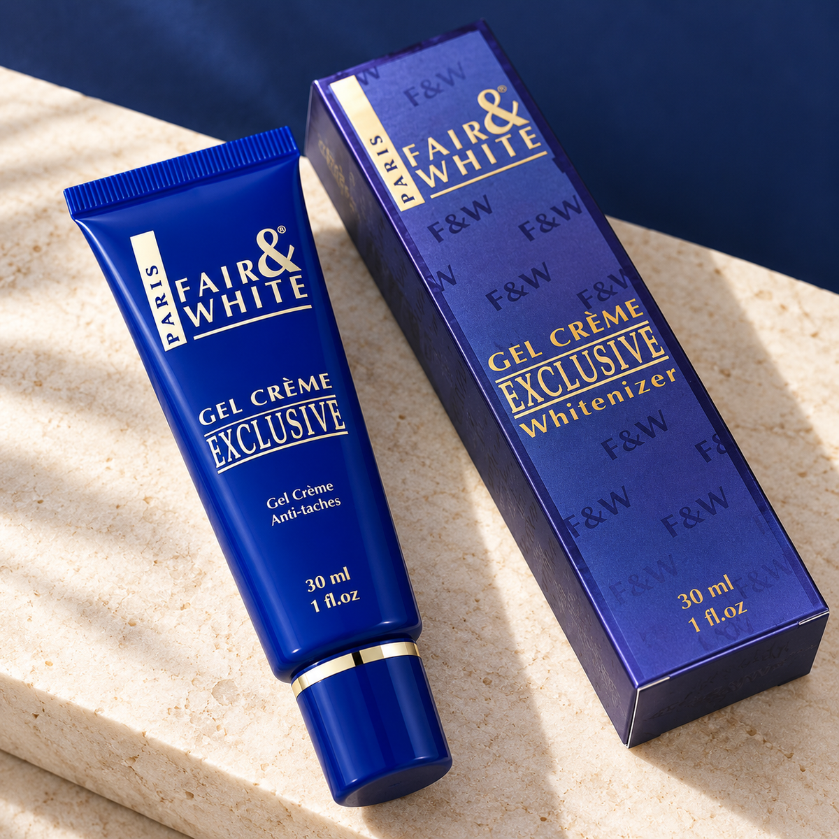 Fair & White Exclusive Whitenizer Gel Cream, one 30 ml tube with its matching carton on an ivory stone surface.