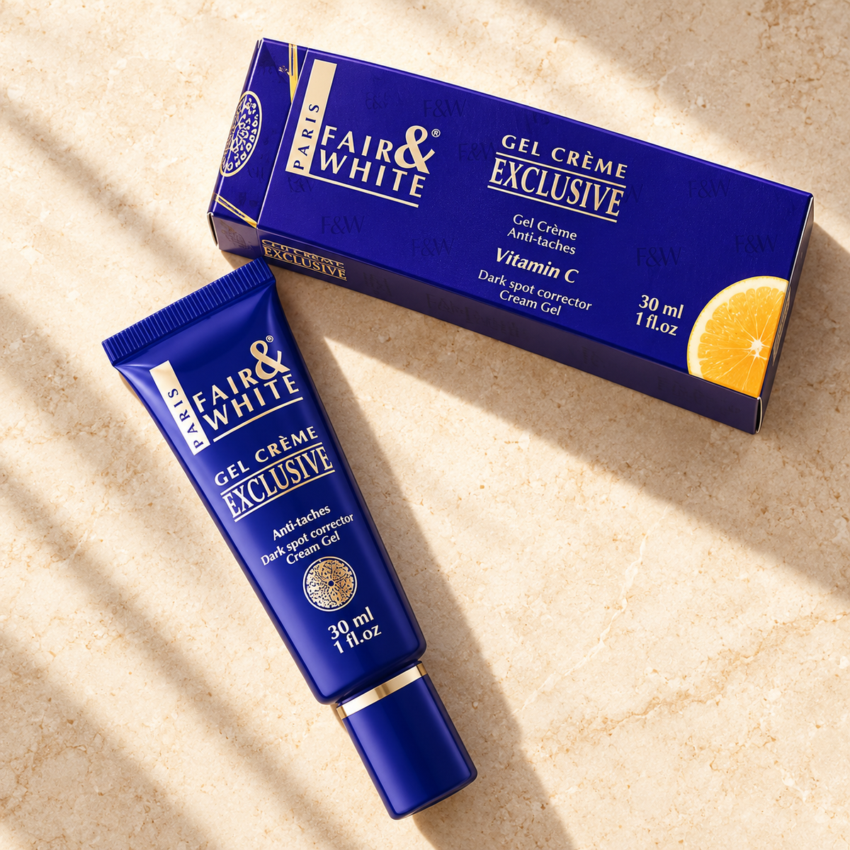 Fair & White Exclusive Vitamin C Gel Cream, one 30 ml tube and its matching printed carton in a new flat-lay composition.