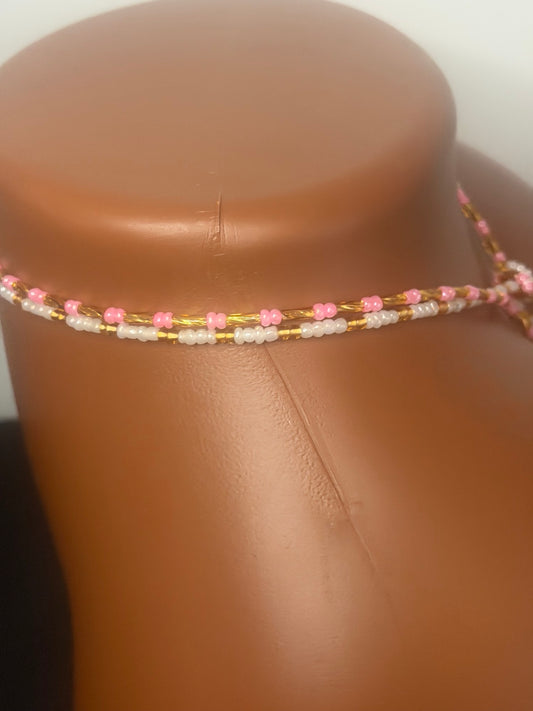 Blush Duo: 2 separate tie-on waist bead strands; Pink & Gold, Pearl & Gold. Actual product photo on display mannequin.